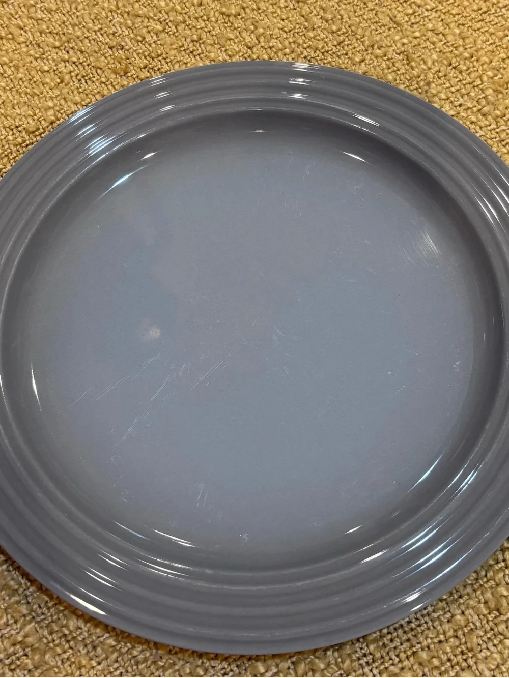 Le Creuset Dinner Plate 10.5 inches. Gray. Good used condition.